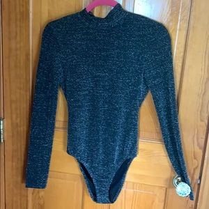 Sparkly long sleeve open back bodysuit